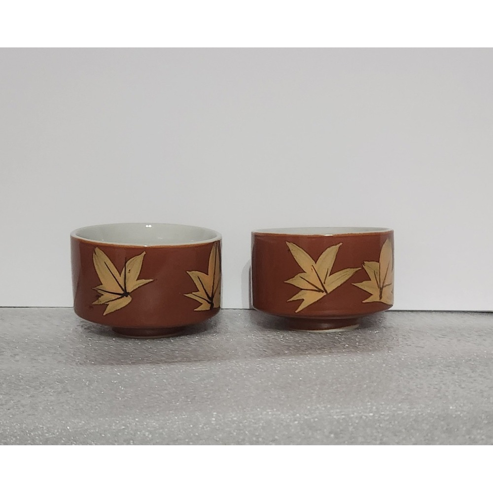 vintage ceramic tea bowls featuring an autumn maple leaf pattern